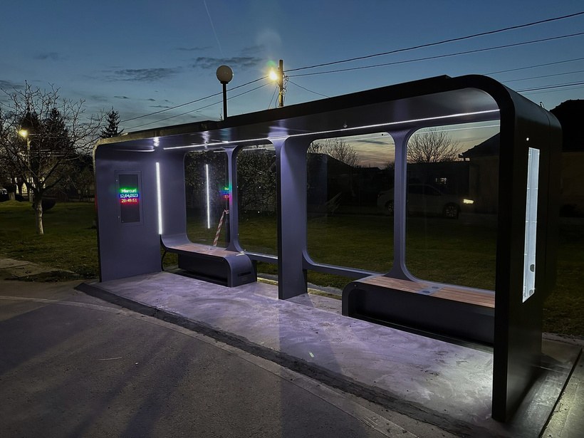 Solar smart bus shelter at night